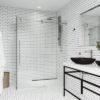 "small-bathroom-with-white-subway-tiled-walls"