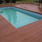 "swimming-pool-with-decking-built-around"