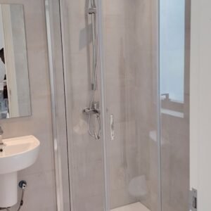 "corner-shower-enclosure-with-sliding doors"